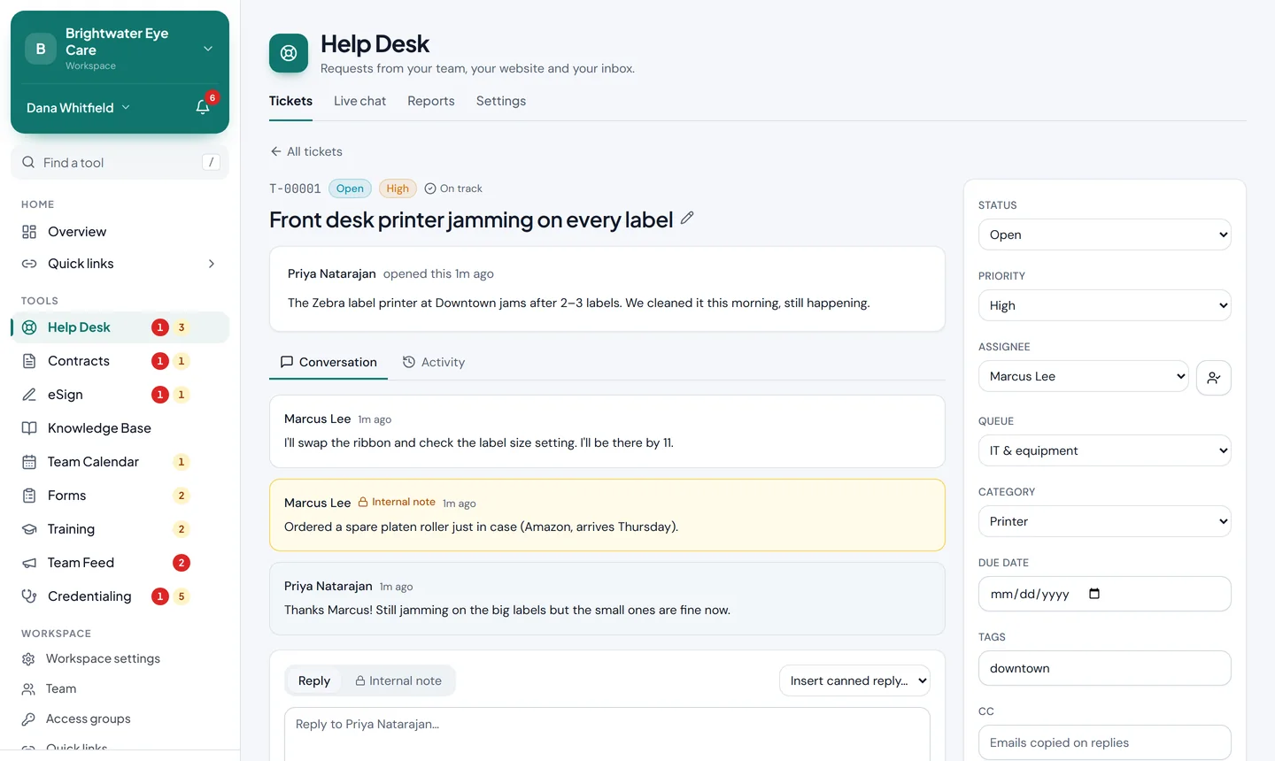 A help desk ticket in Workstead, with the conversation and its status, priority and assignee